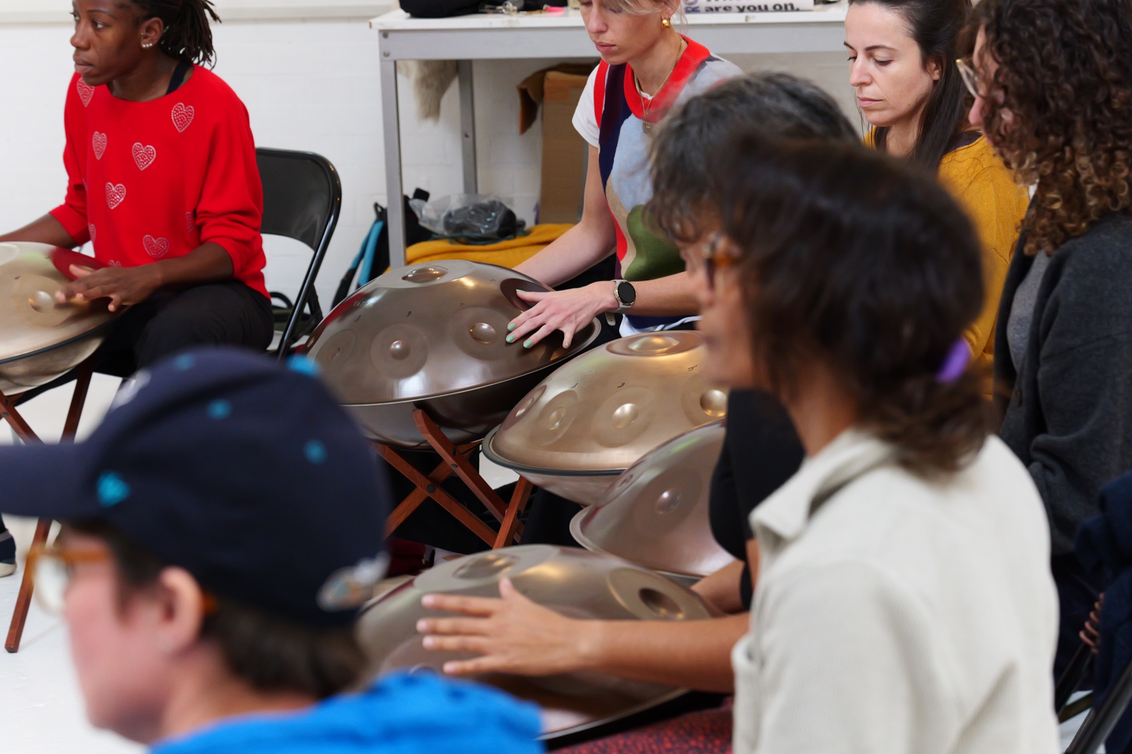 Students learning handpan together